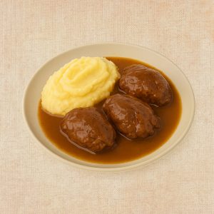 Carrilleras de Cerdo en Salsa con Pure, plato casero saludable de Los Paques de Juan.